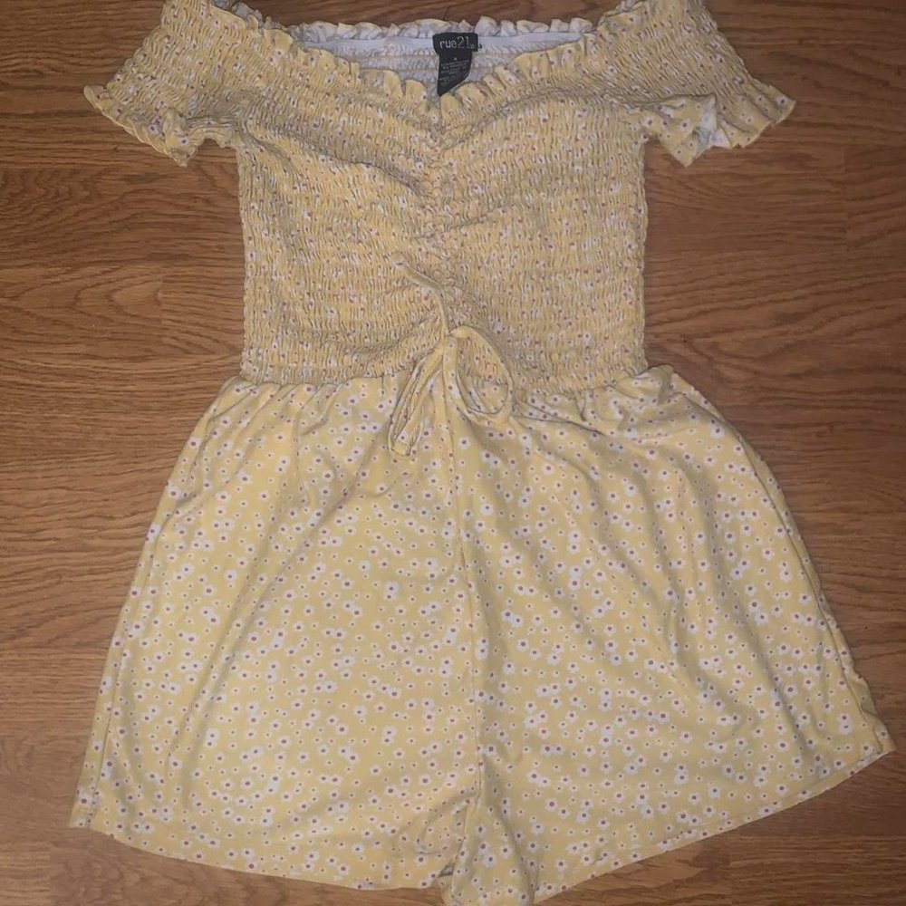 Yellow romper with white daisies
